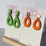 "Fiona" in green apple & "Ellie" in orange - LeonNata