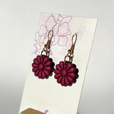 Daisy in burgundy